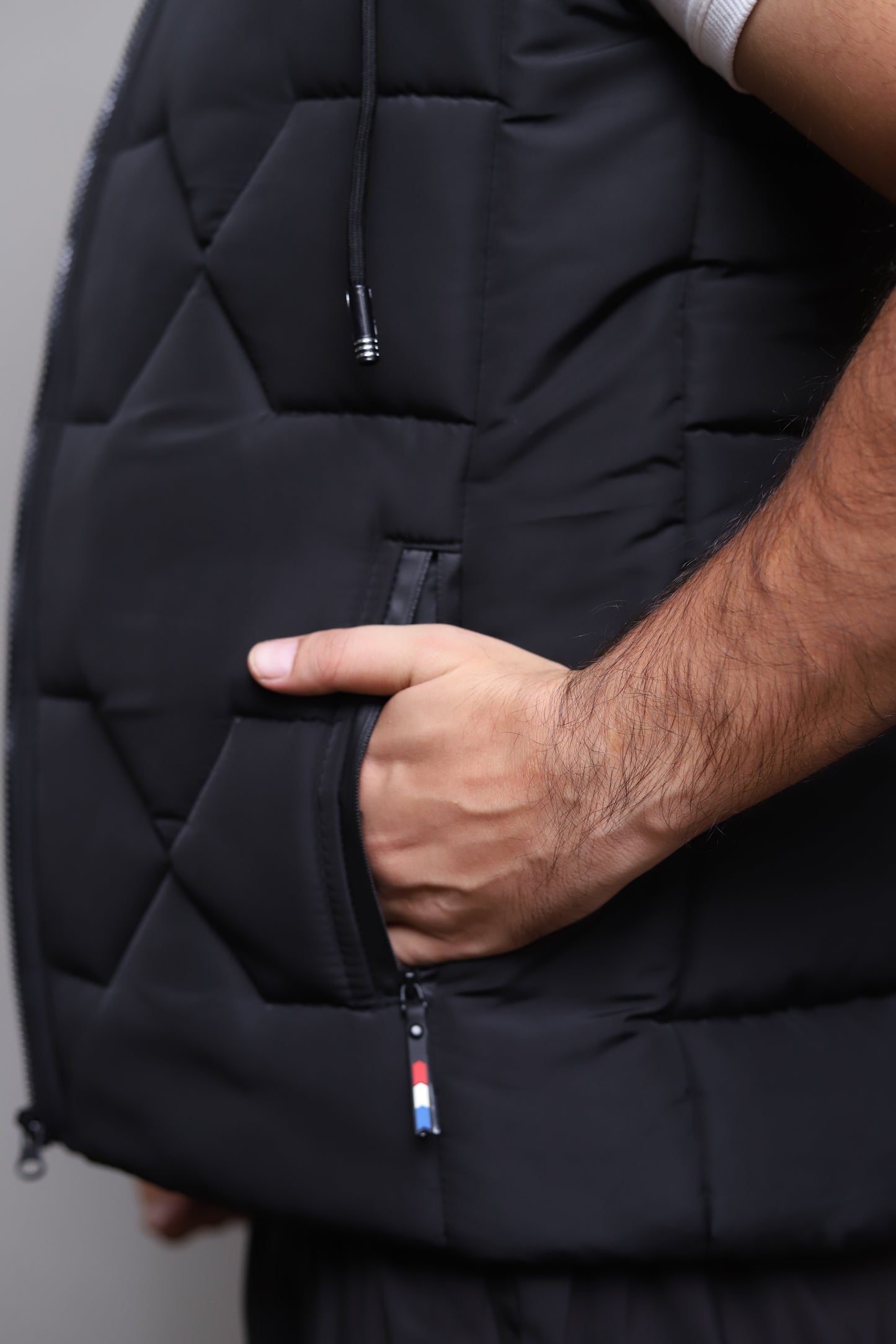 Imported Black sleeveless puffer jacket