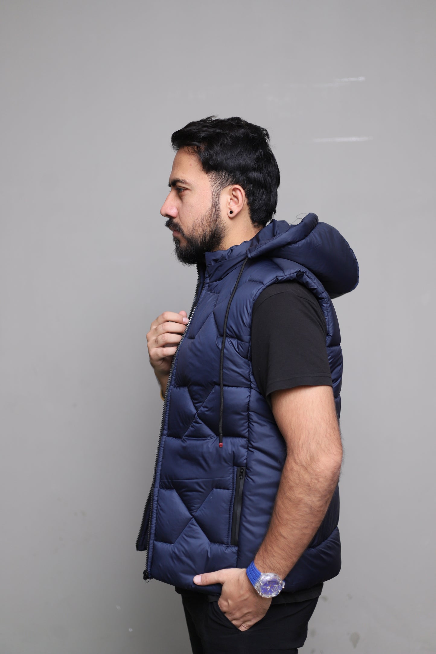 Imported blue sleeveless puffer jacket